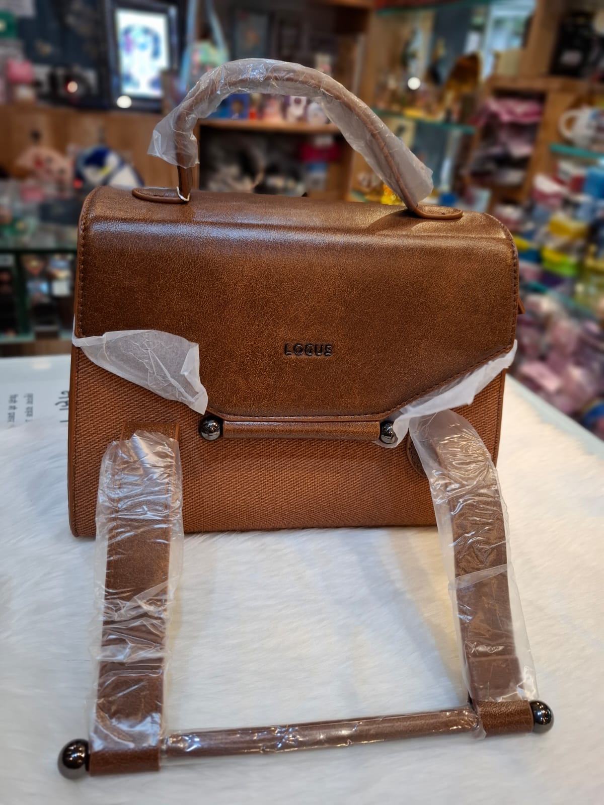 Logus sling bags sale